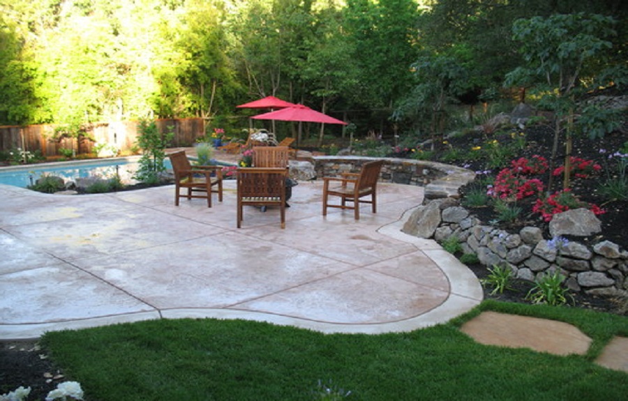 Backyard Stamped Concrete Patterns Design Ideas With Ashlar Stamped Concrete Patterns Around Pool And Wood Patio Furniture